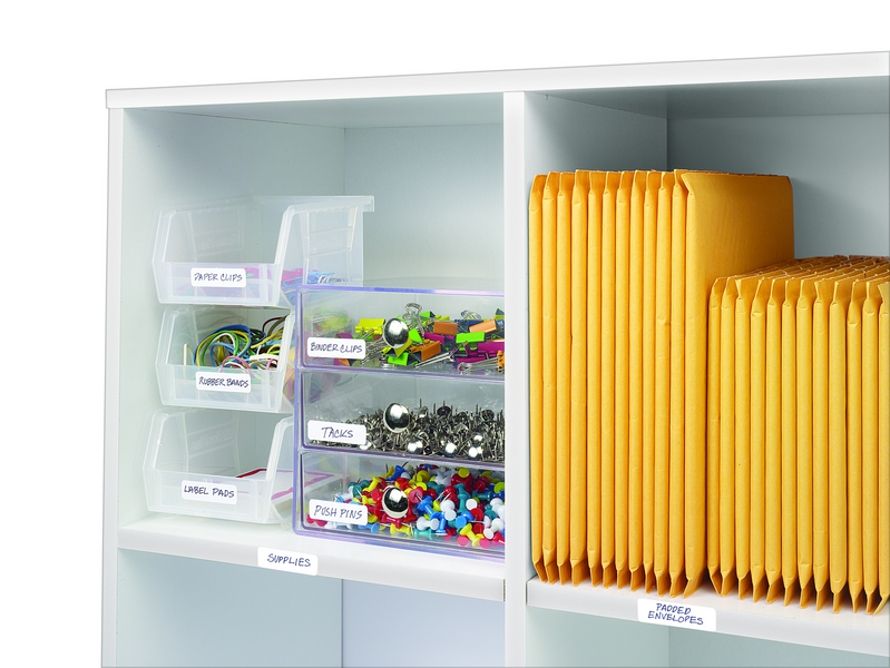 small printable labels on a shelf organizing supplies