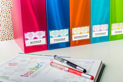 Organize for the week ahead with magazine holders and labels
